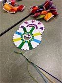 colorful string and other supplies used to create friendship bracelets