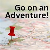 red pushpin stuck in a map with black text reading go on an adventure