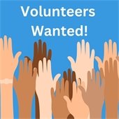 hands raised and white text reading "volunteers wanted"