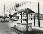 A black and white photo of Rockwell, NC from the 1970s featuring a well and roadway
