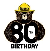 image of smokey bear holding the number 80